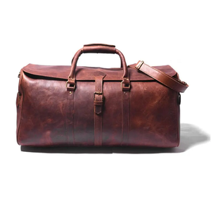 Conçu pour les voyageurs modernes, ce sac de voyage 100 % cuir véritable offre un rangement organisé, des fermetures sécurisées et une grande durabilité. - Product Image 2