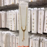 Collier pour femme en acier inoxydable plaqué or, avec chaîne à maillons, papillon, étoile et perles d'imitation, idéal pour les activités de plein air