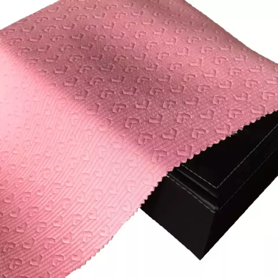 Rosa einzigartiger Textil individuelle Herzmuster solide Farbe Jacquard gesteppt Polyester gestrickte Stoffe für Kinderkleidung