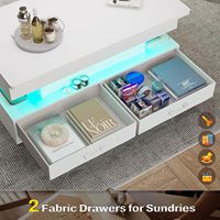 Table basse moderne à plateau relevable avec éclairage LED et design à panneaux, 2 tiroirs en tissu, pour usage domestique dans un petit salon, salle à manger ou bureau