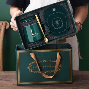 แก้วกาแฟเซรามิคพิมพ์โลโก้ตามสั่ง Sy557 พร้อมแผ่นทำความร้อนควบคุมอุณหภูมิ ของขวัญส่งเสริมการขายสำหรับกิจกรรมองค์กรและธุรกิจ - Product Image 1