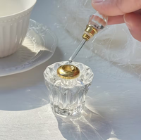 Vente en gros de flacons cylindriques transparents durables, gravés, pour la promotion, mini flacons mignons de 3 ml pour parfum, huile essentielle, cosmétiques, emballage vide en cristal