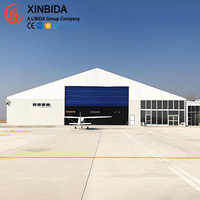 Structures de hangar en acier polyvalentes et personnalisables pour base aéronautique, cadre rigide Q355B avec marquage CE et revêtement Galvalume