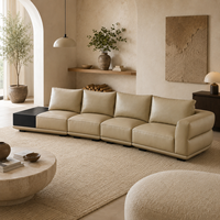 Ensemble de canapés modulaires modernes en cuir véritable en forme de L, design écologique, table d'appoint noire, sièges larges pour appartement et hôtel