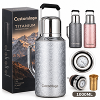 Bouteille d'eau isotherme de luxe en titane de 34 oz avec affichage de la température, grande capacité, poignée de transport portable pour le voyage – Vente en gros