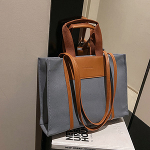 กระเป๋าถือแบบพกพาใหม่ล่าสุด กันน้ำ พร้อมโลโก้สั่งทำ หนัง PU สีต่างๆ สำหรับผู้หญิง แบรนด์ Tanjing - Product Image 3