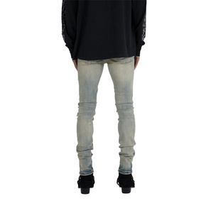 กางเกงยีนส์ขาดทรงสกินนี่ฟิตสำหรับผู้ชาย - สีน้ำเงินอ่อนพร้อมดีเทลขาดแบบหนัก - Product Image 4