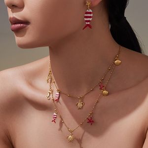 Bracciale, Collana e Orecchini in Acciaio Inox con Zirconi 5A Rosso Corallo, Design Elegante con Polpo e Tartaruga - Product Image 5