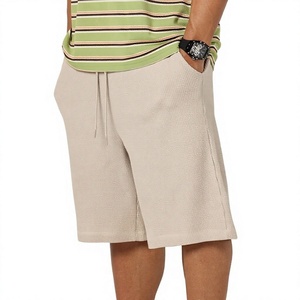Shorts Bermuda Sportifs en Tricot Beige pour Homme avec Cordon de Serrage à la Taille et Poches, en Polyester Infroissable, Couleur Unie, Design Respirant - Product Image 1
