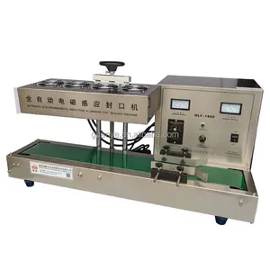 Otomatik otomatik sürekli manyetik alüminyum Film indüksiyon mühürleyen yapıştırma makinesi