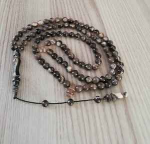 Perles de prière artisanales en corne de buffle naturelle, conçues pour la méditation, la pleine conscience et la pratique religieuse. - Product Image 1