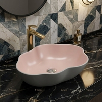 Lavabo de cerámica montado sobre encimera personalizado de fábrica recién llegado con forma creativa lavabo de arte hecho a mano para Baño