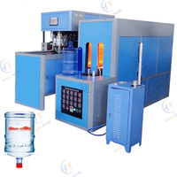 Machine de moulage par soufflage de bouteilles d'eau 1l 2l 5l 20 l semi-automatique Machine de moulage par soufflage de bouteilles en plastique de 20 litres