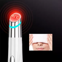 Draadloze elektrische handverwarmings-oogmassagepen met vibrerende gekleurde licht-ionen warme oogmassage-apparaat voor thuisgebruik