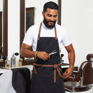 Capes et tabliers en jean personnalisés avec logo, avec sangle en coton réglable à dos croisé, confortables pour les salons et les barbiers - Product Image 1