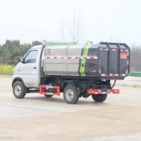 Mini camion à ordures compacteur diesel à chargement latéral avec crochet latéral, boîte de vitesses manuelle, transmission 4x2, pompe pour bacs de 120L/240L