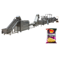 Machine à frire continue de grande capacité pour le traitement de boules de pâte de poulet de viande de pâte frite pour les lignes alimentaires de fruits et de bonbons