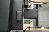 Reformer de Pilates portable en chêne pliable pour la musculation