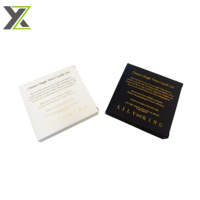 Boîtes en papier personnalisées blanc et noir avec logo estampé à chaud or pour bougies