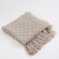 Großhandel Einfarbige Boho Quasten-Fransen-Decke Leichte Atmungsaktive Diamant-Waffelstruktur Strickdecke OEM für Wohndekor