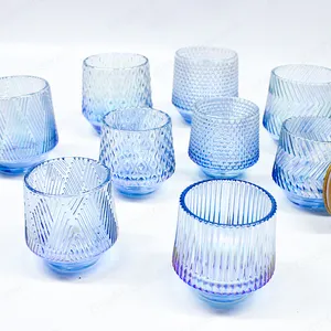 批发玻璃器皿现代彩色压制蓝色玻璃不倒翁杯电镀渐变蓝色蜡烛容器罐带底座