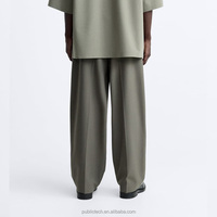 Pantalones británicos informales todo en uno OEM, pantalones de traje de tendencia holgados de edición coreana para hombre, Verano