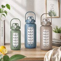 Bouteille d'eau sport grande capacité en verre borosilicate transparent avec paille et manchon en silicone pour la gym et le camping