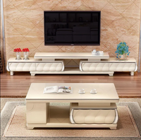 Combinaison de table basse de meuble TV en marbre est moderne, simple et rétractable.