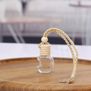 Botella de cristal transparente con forma de manzana para coche, difusor colgante con tapa de madera, 10ml, venta al por mayor - Product Image 2