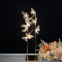 Lampadaire solaire LED papillon de luxe en gros avec 6/9 têtes pour la décoration de couloirs de mariage