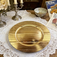 Assiettes de service rondes en plastique PP acrylique doré métallisé effet rayon de soleil pour la décoration de table