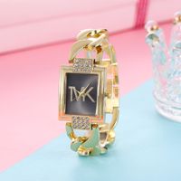 Montre à Bracelet à Quartz pour Femme Tendance, Créative et Polyvalente, Design Carré Creux Sertie de Diamants en Acier Inoxydable
