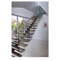Escaliers modernes à marches intérieures à LED, à poutre simple, avec escalier en bois et acier au carbone pour application en villa