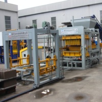 Machine à fabriquer des briques en ciment hydraulique QT4-15 pour petite usine de blocs