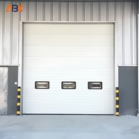 Porte sectionnelle industrielle résistante au vent, isolée thermiquement, à ouverture latérale électrique, pour hôpitaux et centres commerciaux, directement de l'usine
