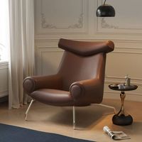 Fauteuil lounge moderne en cuir marron chocolat avec appui-tête en corne, accoudoirs tubulaires, pieds en métal – Chaise d'appoint design pour salon et hôtel