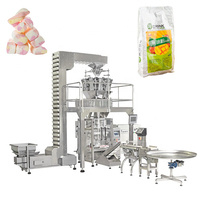 Peseuse combinée multifonctions à 14 têtes Remplissage de noix de bonbons gommeux Peseuse multitête automatique Machine d'emballage