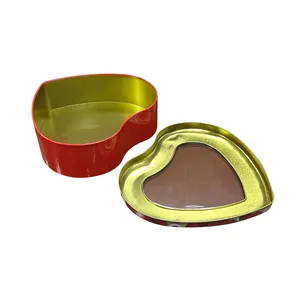 منتجات فريدة من نوعها صندوق شوكولاتة من القصدير على شكل قلب معدني للحفلات علبة هدايا على شكل قلب مع زهرة للبسكويت
