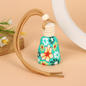 Botella de perfume de coche recargable con cubierta de arcilla suave, flor mixta, difusor colgante personalizado para ambientador y decoración de coche - Product Image 3