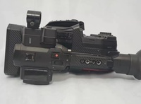 Caméra vidéo numérique 4K Panasonic AG-DVX200MC haut de gamme, 90 % neuve, avec objectif intégré