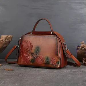 Son Premium kadın ithal el çantası fabrika bayan moda tasarımcısı için dokulu deri Mini el çantası bayanlar kahverengi çanta