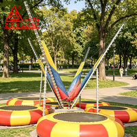 Trampoline gonflable électrique commercial Sanly 4-en-1 pour quatre personnes, construction durable, logo personnalisé, divertissement extérieur avec cordes élastiques