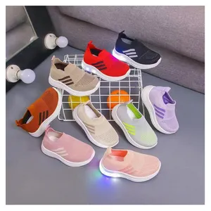 Custom PVC Outsole flying knitting running sneakers children casual slip-on boy and girls LED shoes for kids