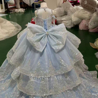 Robe de demoiselle d'honneur bleu clair scintillante Mc047 avec perles argentées, volants et nœud, idéale pour les mariages et cérémonies Jancember
