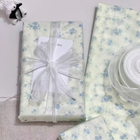 Papier d'emballage en tissu personnalisé pour l'emballage des vêtements avec des caractéristiques écologiques biodégradables