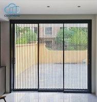Porte pliante panoramique minimaliste en aluminium noir avec moustiquaire invisible, porte intérieure en verre pour patio, appartement et véranda