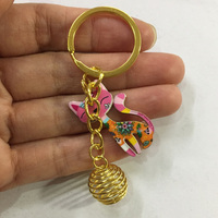 NOUVELLE ARRIVÉE Porte-clés tendance en alliage plaqué or avec breloque chat mignon et support de pièce de monnaie en cage, 25 mm, pour décoration de sac