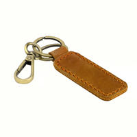 Porte-clés en cuir souple avec boussole vintage faite à la main en alliage de zinc durable et mousqueton pivotant, idéal pour un cadeau d'affaires