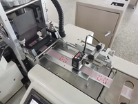 Machine automatique de découpe et de pliage d'étiquettes à ultrasons à vitesse de 200 pièces/min pour étiquettes en ruban de satin polyester