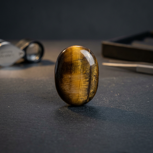 Pierre précieuse œil de tigre ovale polie pour la décoration et la collection - Product Image 1